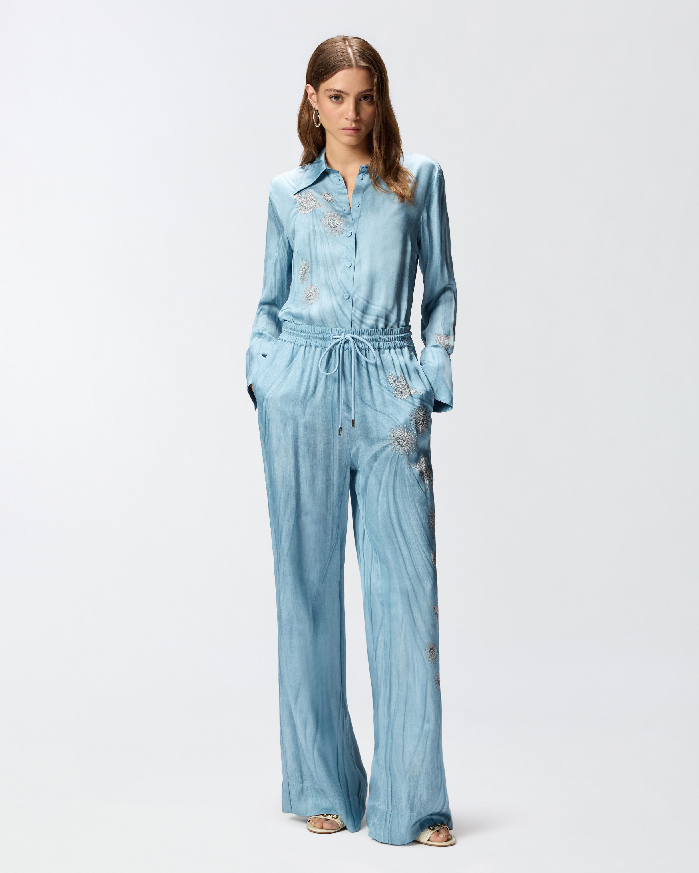 Fließende Hose Mit Abgesetztem Schmuckprint